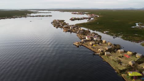 floating islands with houses on top on lake titicaca peru