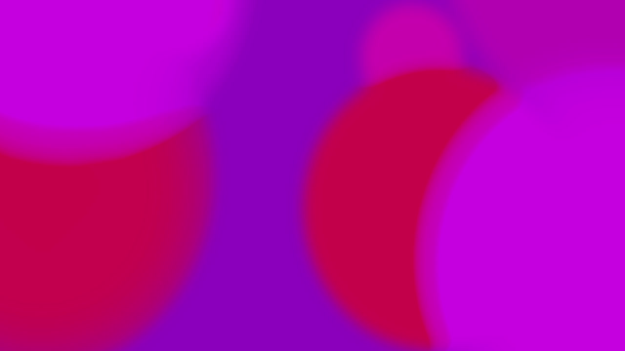 Animation of glowing multi coloured gradient abstract out of focus shapes
