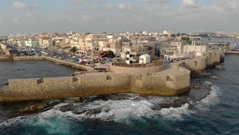 aerial footage over the old city of acre and the mediterranean sea