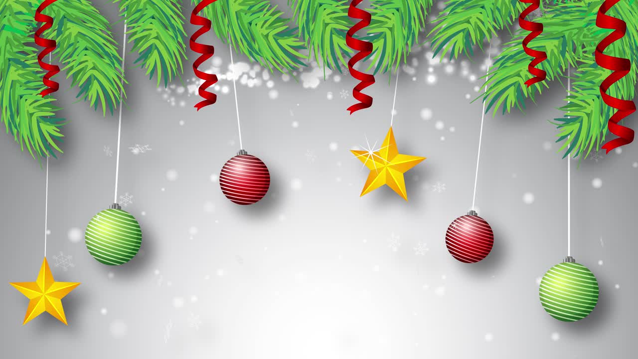 las decoraciones navideñas descienden en medio de los copos de nieve.