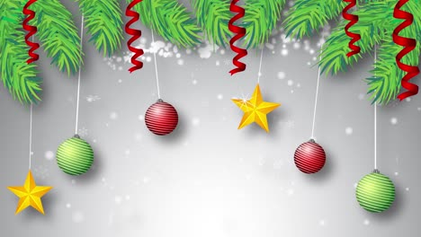 las decoraciones navideñas descienden en medio de los copos de nieve.