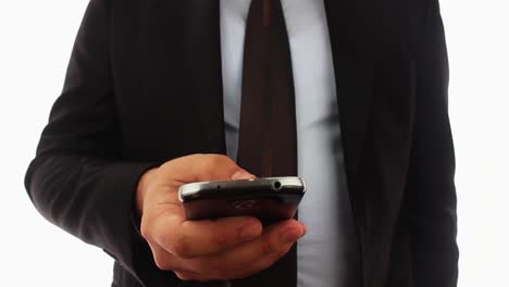 Businessman-Hands-Using-Mobile-Phone-2