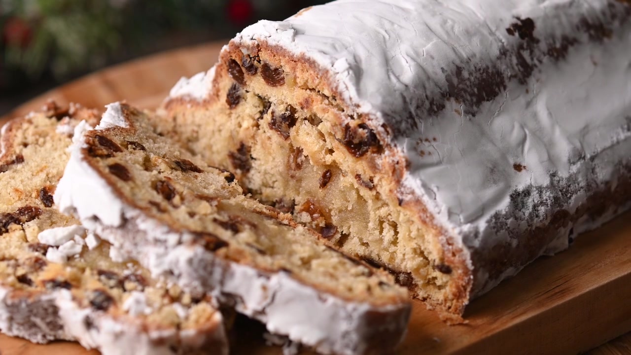 Traditional Christmas Stollen with Raisins and Powdered Sugar