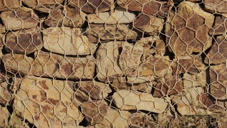 stone wall with wire mesh