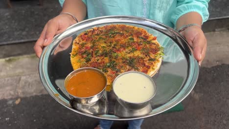 masala uttapam served with sambar and chutney