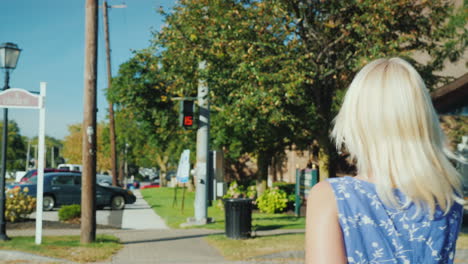 Woman-Talking-on-Phone-Using-Crosswalk