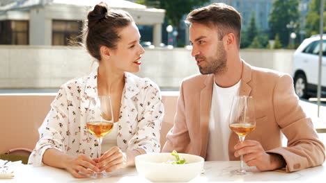 couple enjoying a romantic lunch date outdoors