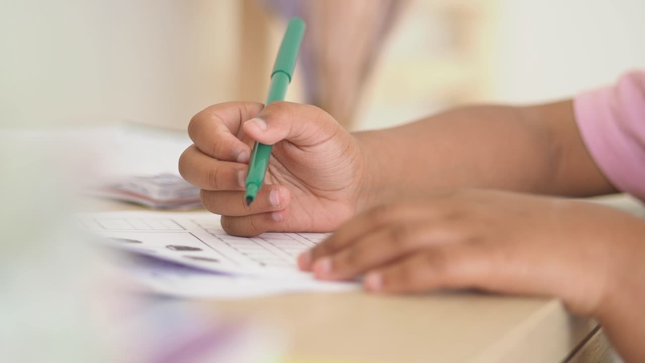 Child practicing writing or drawing