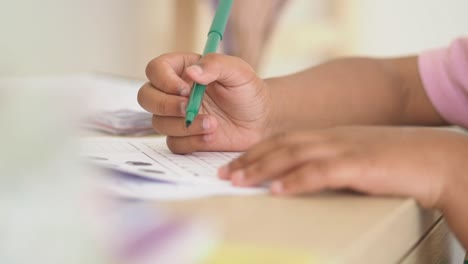 child practicing writing or drawing