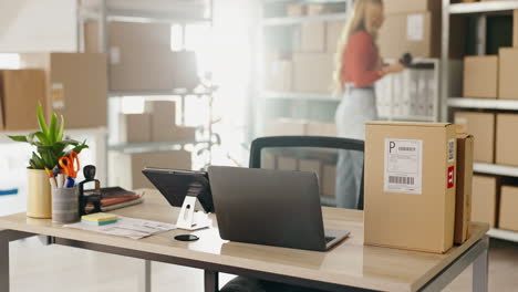 office desk with boxes and shipping supplies