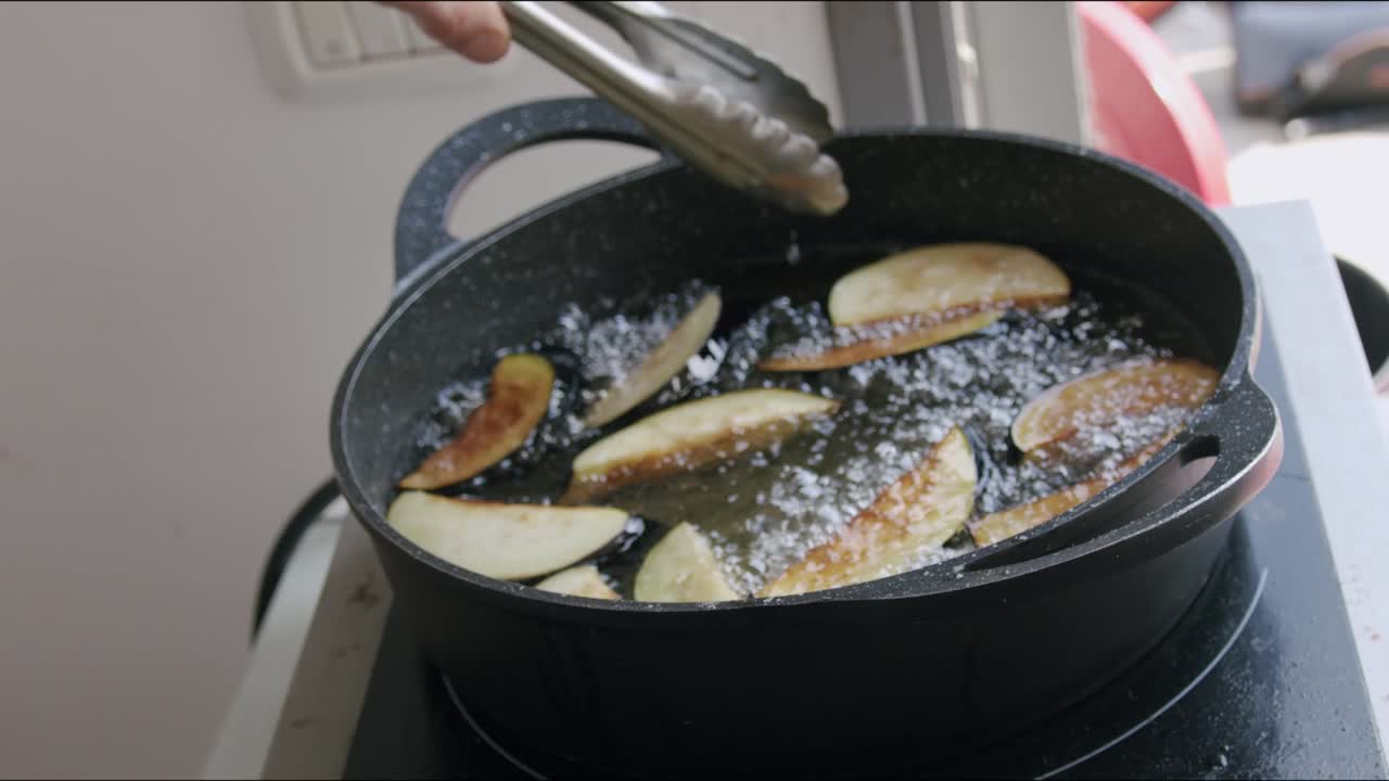Chef frying eggplant
Shot in 2