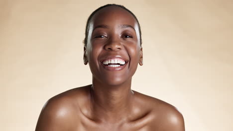 Face,-skincare-and-laughter-with-a-model-black