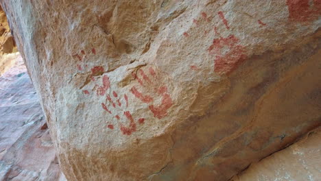 hand prints on red rock hills of blue mountains national park in new south wales, australia