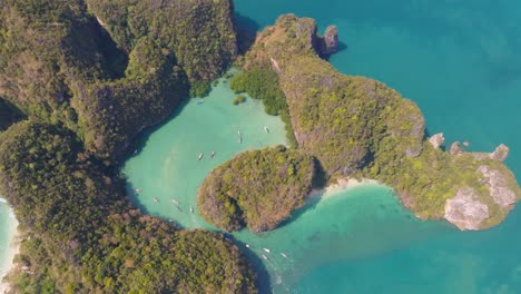 4K-aerial-drone-footage-of-Hong-Island,-Ko-Hong,-Lagoon,-Long-tail-boats,-Thailand,-Asia