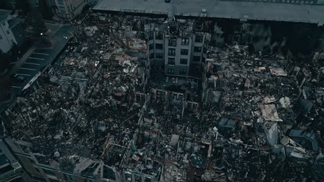 aerial top view of destroyed home in american neighborhood after fire