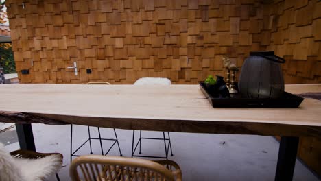 table with wooden walls around it