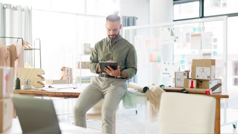 fashion designer man on tablet in startup office