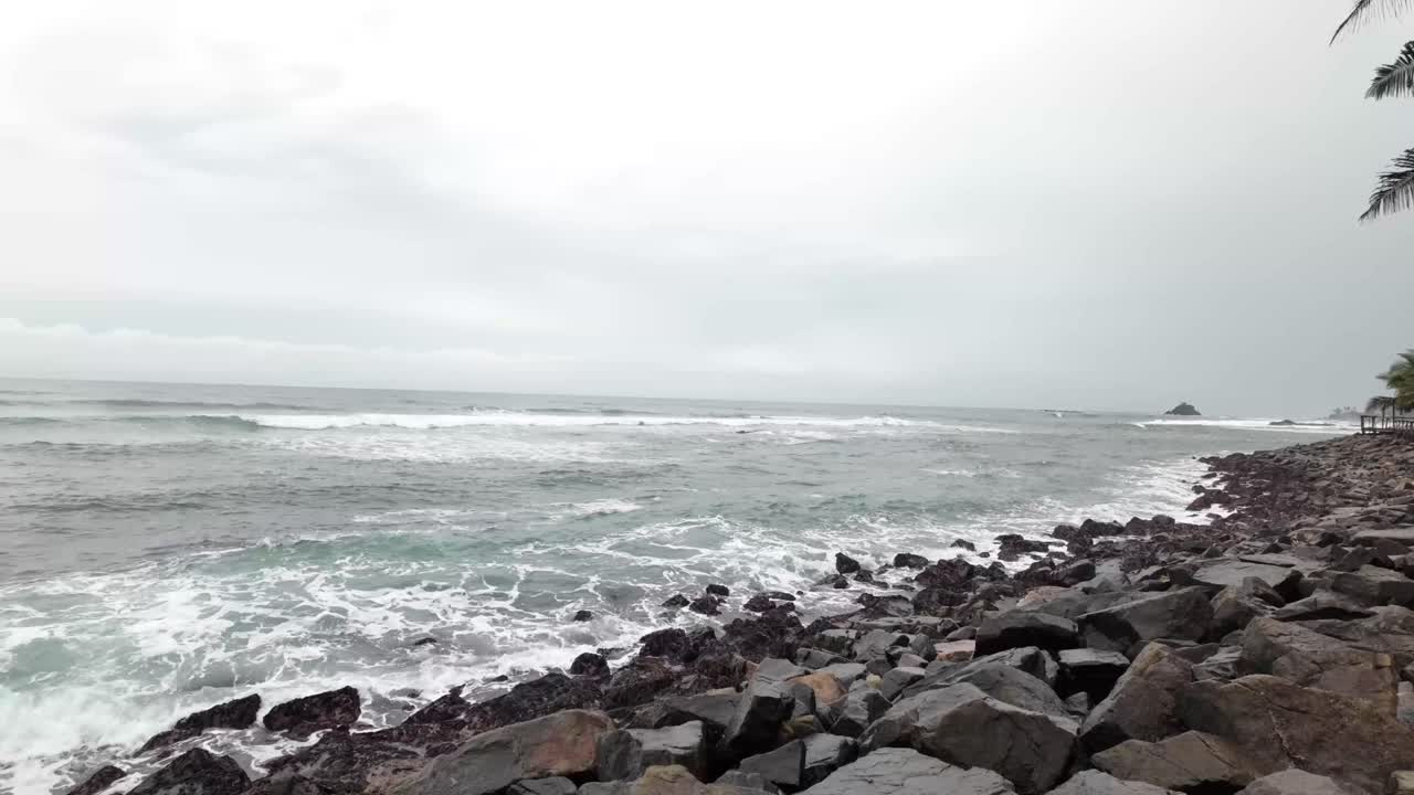 Rocky shore coastline Sri Lanka stormy Indian ocean nature landscape South Asia