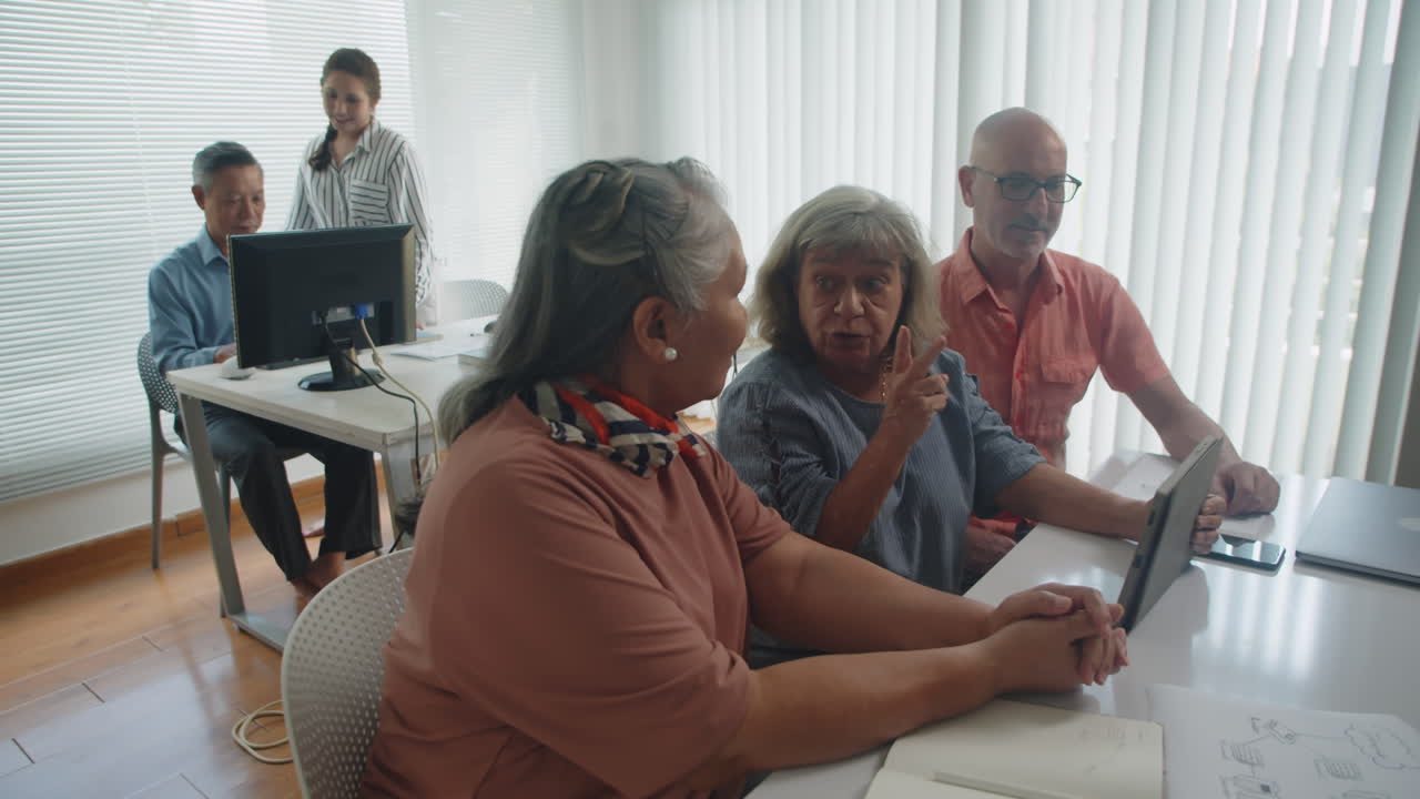 Seniors Learning to Use Digital Tablet