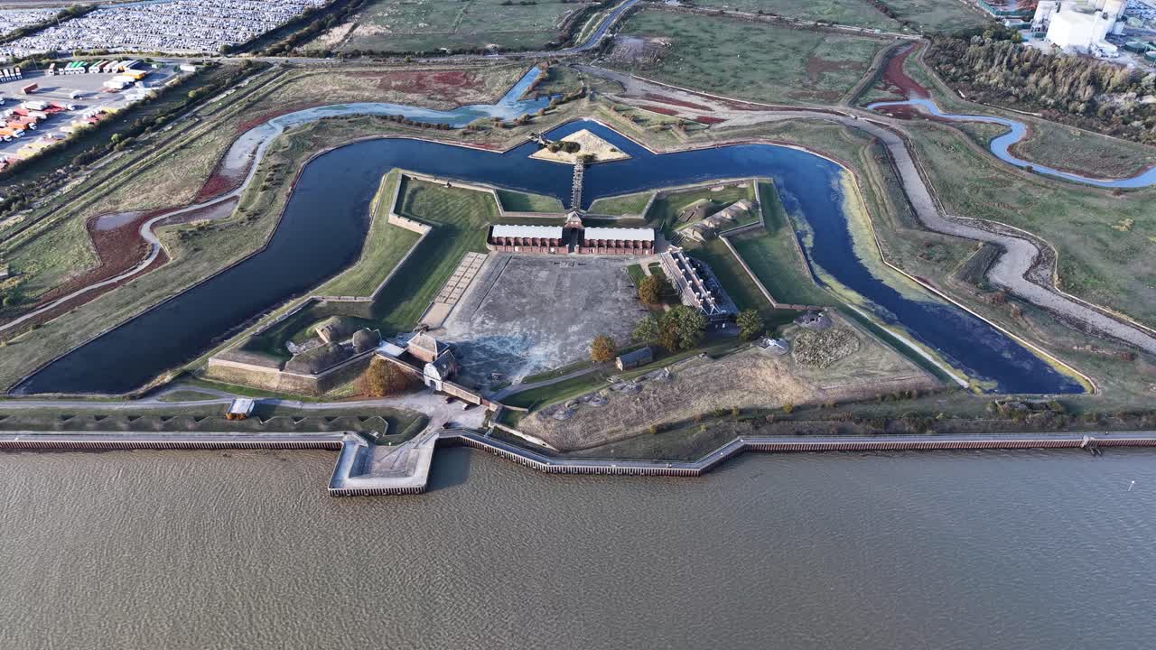 Tilbury fort coastal star shaped fortress aerial view rising above the River Thames heritage site