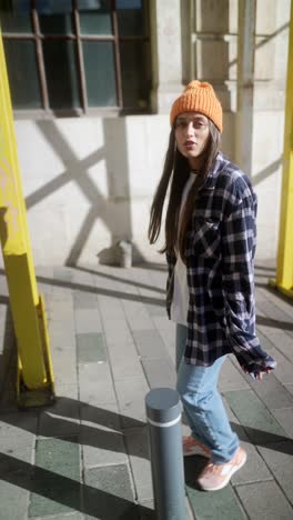 young woman in trendy urban outfit