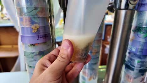 close-up view about of a glass filled with golden beer at the service desk, france.
