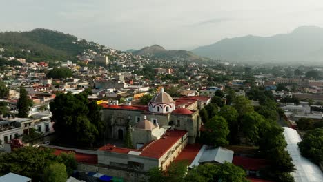 drone: dolly in shot of el templo del carmen alto in oaxaca