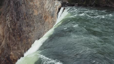 Strong-waterfall-falling-over-cliff