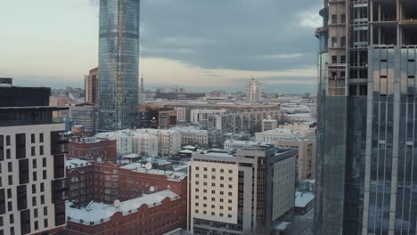 cityscape in winter with modern and historical buildings