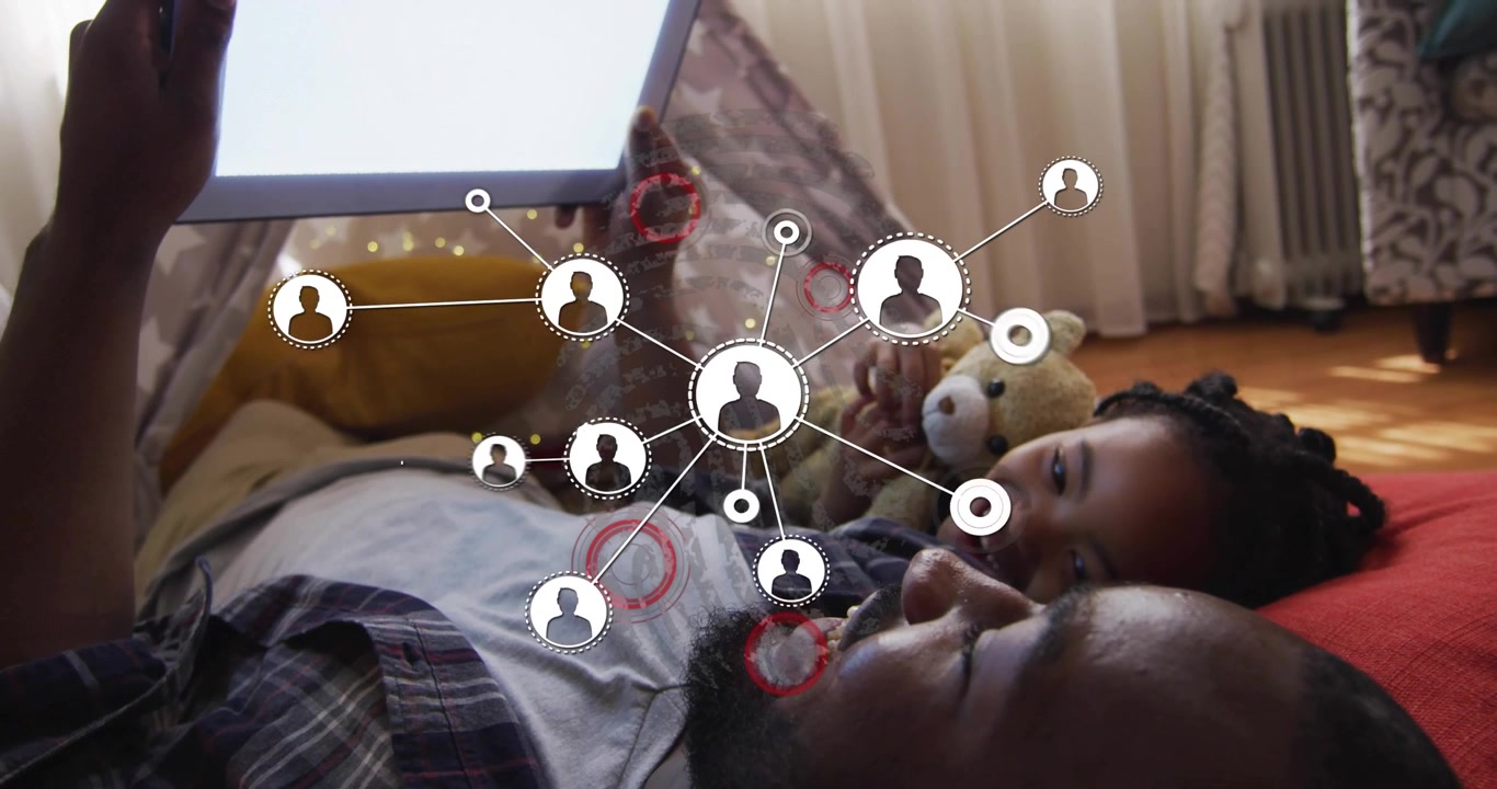 Vertical video: Father holding tablet sparking network nodes over tent, demonstrating tech links