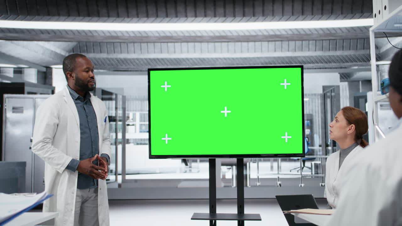 Chroma key display used by lab specialist presenting innovative project