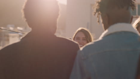 group-of-diverse-friends-hanging-out-dancing-together-enjoying-rooftop-party-at-sunset-drinking-alcohol-having-fun-on-weekend-celebration