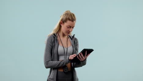 Thinking,-fitness-and-woman-with-a-tablet