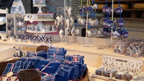 gouda souvenirs for sale inside the de goudse waag cheese and craft museum in gouda, netherlands