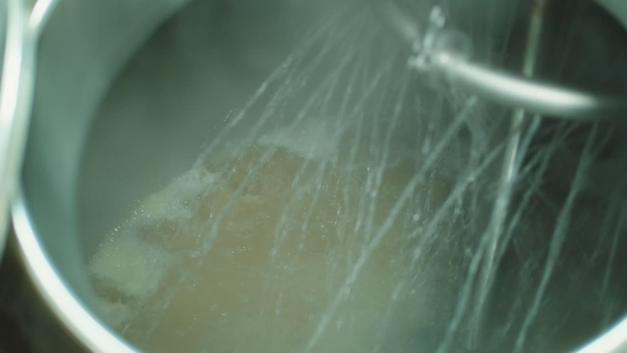 Craft beer production factory, brewery manufacture, cooking alcohol in metal vats bottles