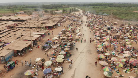 traveling left over the informal market, caxito in angola, africa