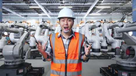 Engineer Surprised by Robots in a Factory
