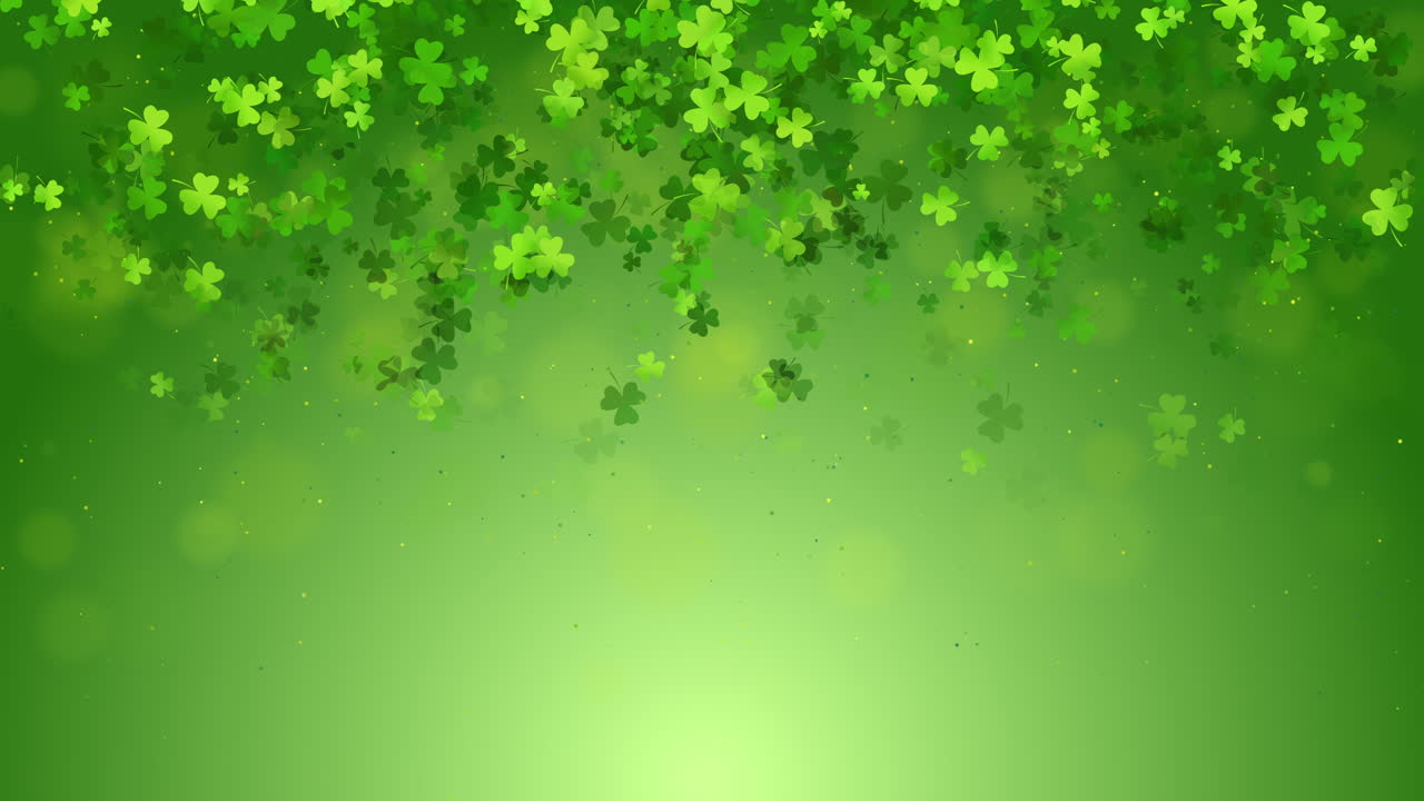 Shamrock green clover leaves pattern loop background. St Patricks Day shamrock symbols decorative elements pattern. Festive animation with blank space for greeting text.