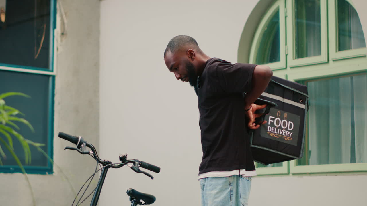 Food delivery driver with bicycle