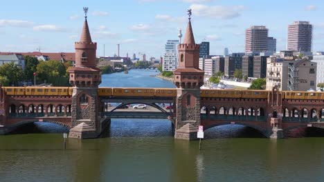 suburban train summer day east west berlin border river bridge germany