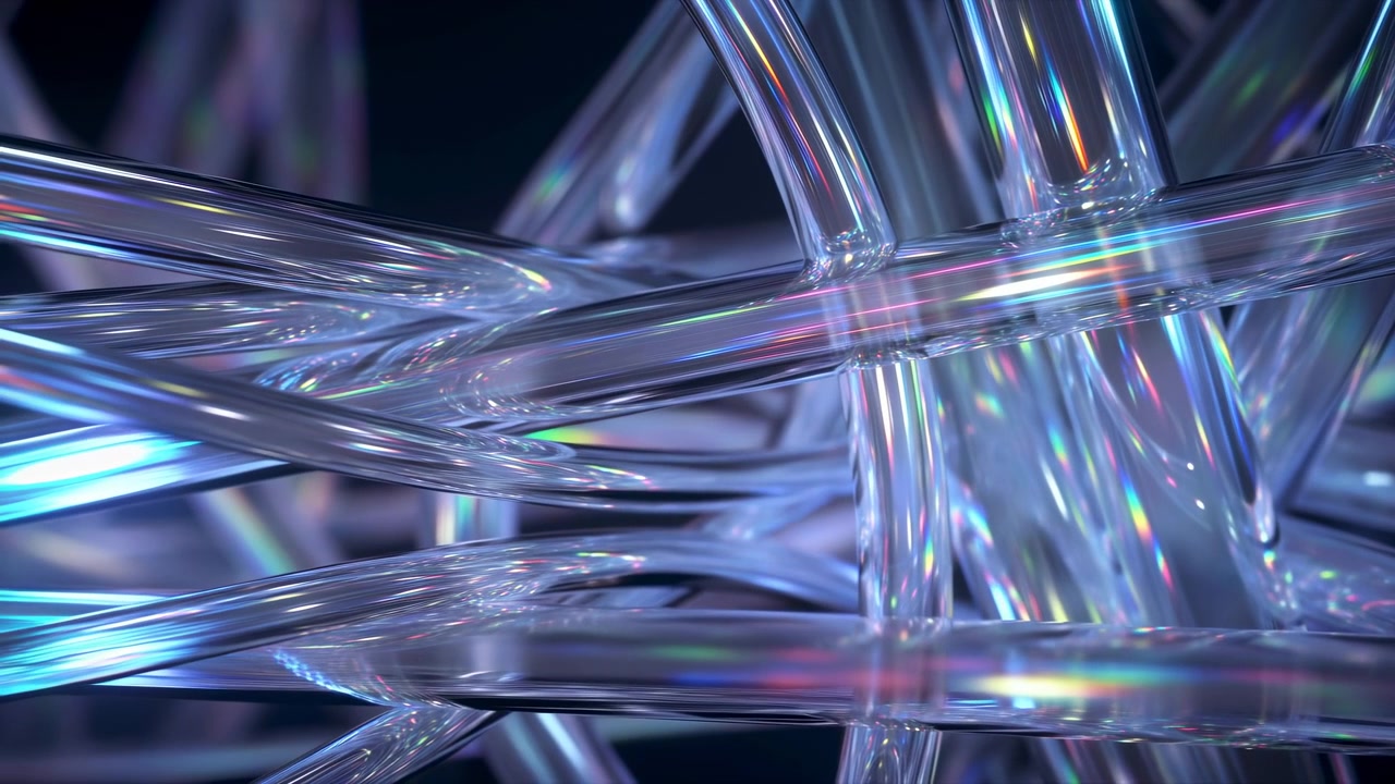 Abstract close-up of translucent glossy tubes crossing diagonally in layered curves, with rainbow reflections and a sleek futuristic look against a dark