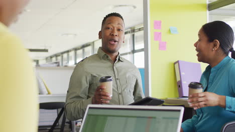 african american business people having meeting at office, slow motion