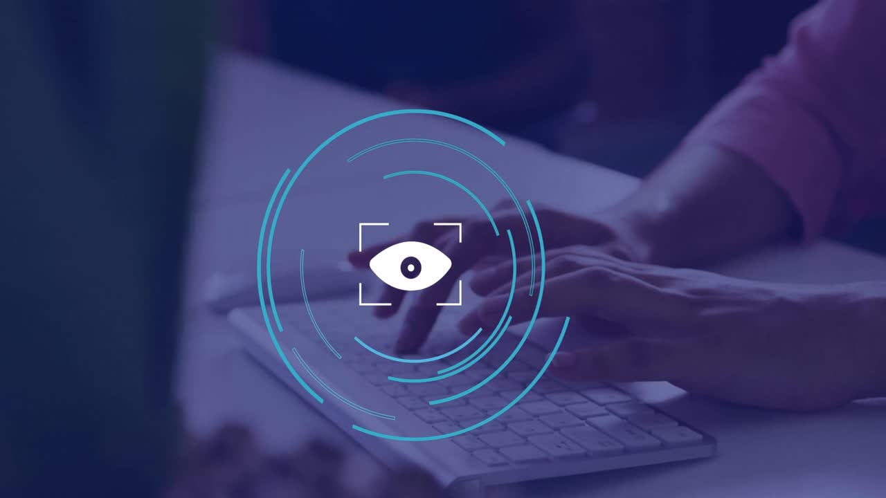 animación del icono del ojo sobre las manos usando la computadora en la oficina
