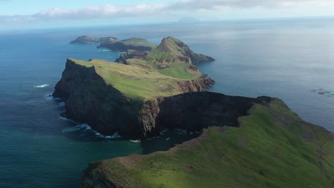 Drone-shot-over-the-small-islands-and-the-peninsula-during-sunny-daytime-in-Madeira