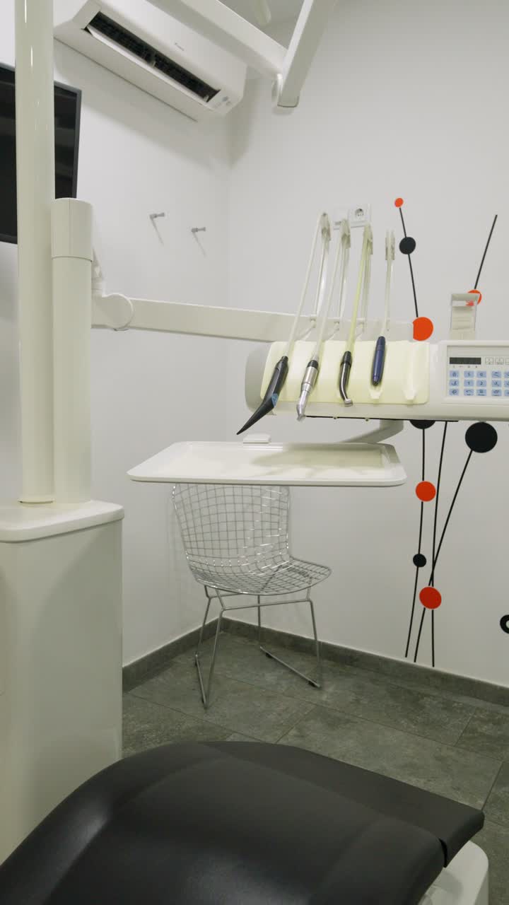 Empty Modern Dental Examination Room with Equipment