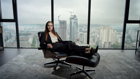 businesswoman sitting on chair in office. entrepreneur relaxing on office chair