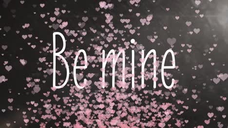 animation of be mine with pink hearts on background