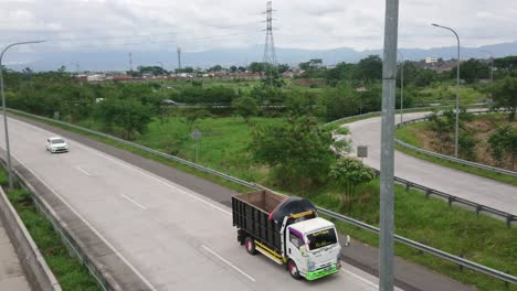 the condition of the toll road looks deserted, cars are passing on toll roads