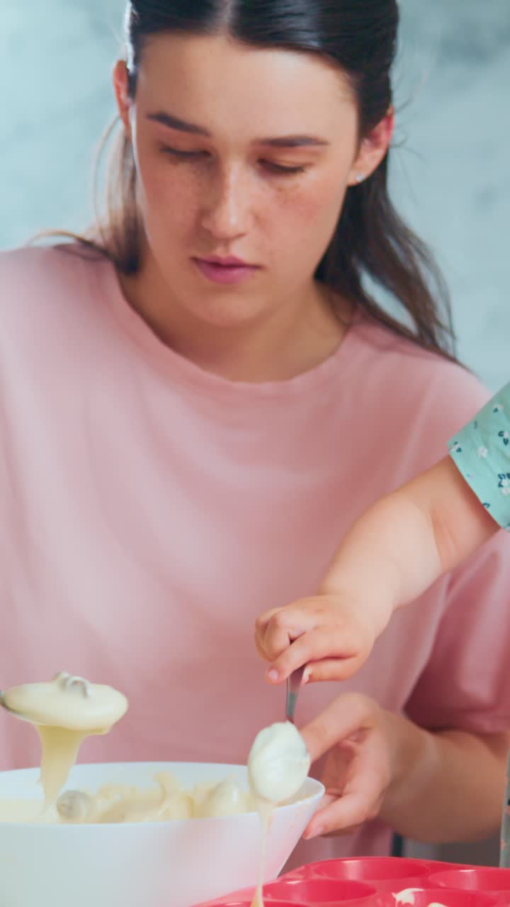 A Heartwarming Moment in the Kitchen: A Parent and Child Bonding Over Baking, Creating Memorable Experiences with Love and Laughter