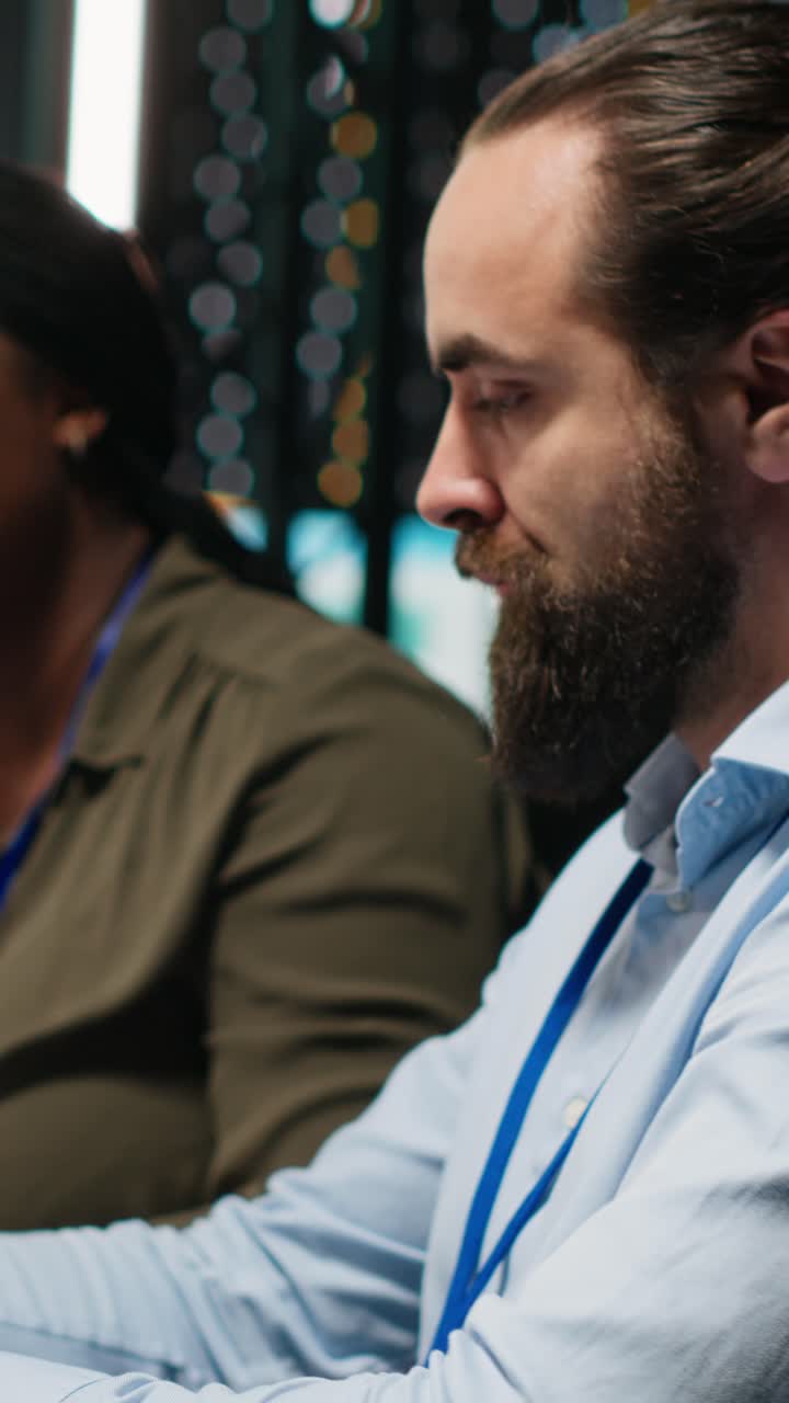 Vertical Video Team of business associates examining infographics and legal data